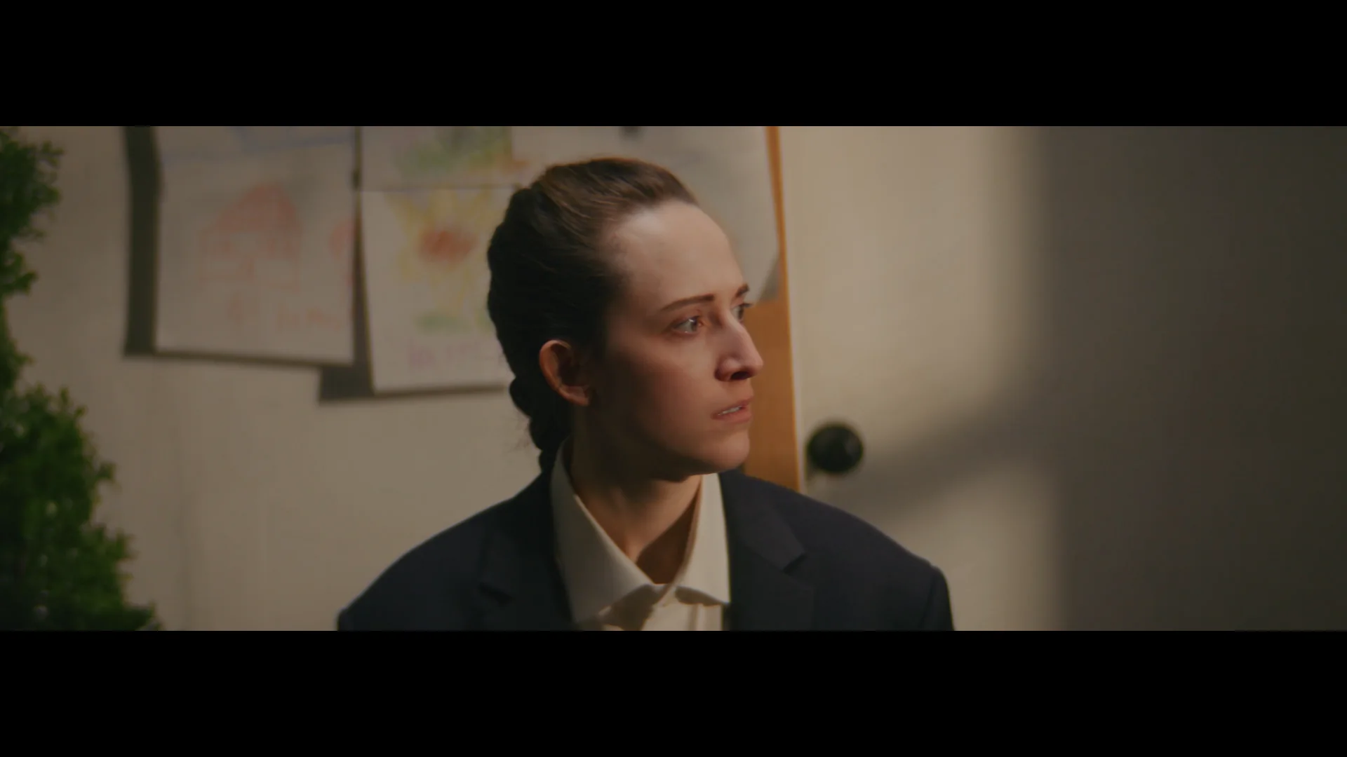 Linds Esch performing in a cinematic scene from KEVIN